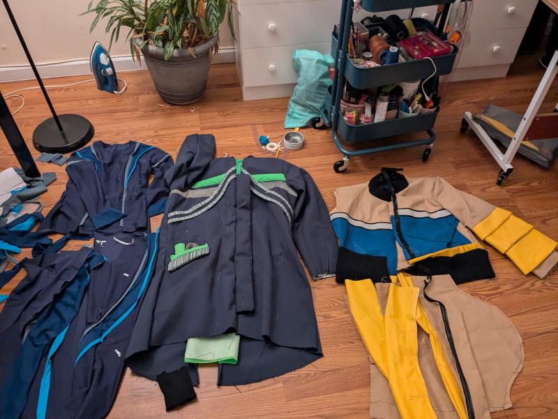 Garments in the making on the floor, messy living room